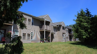 Senior Housing near Camillus NY thumbnail image of connelly acres apartments rear view from two plus four property management