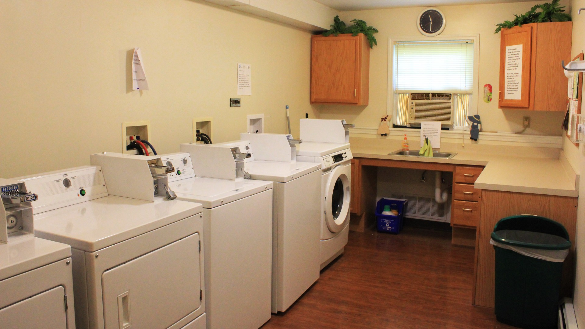 Senior Housing near Marcellus NY image of upper crown landing community laundry room from two plus four management