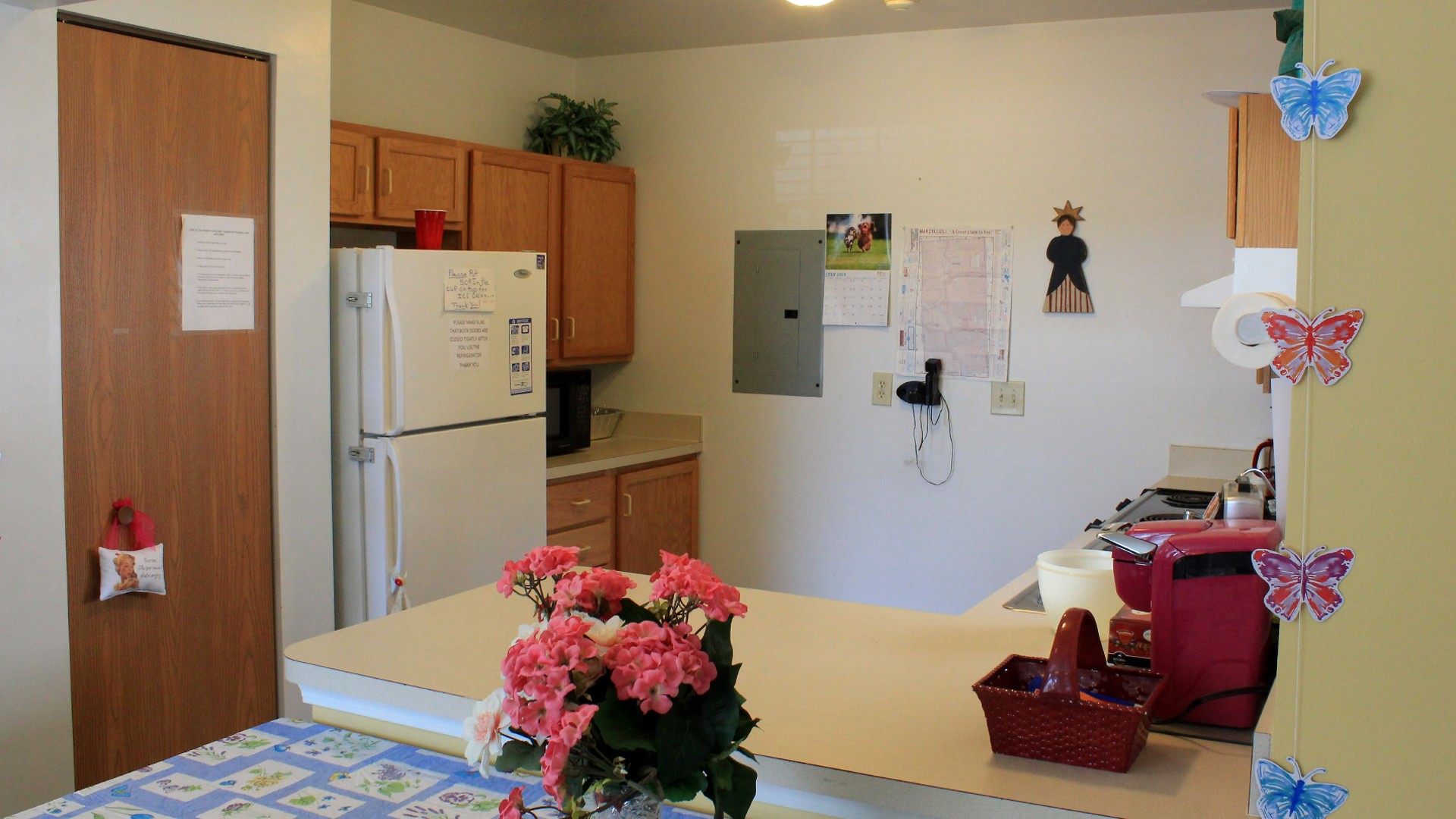 Senior Housing near Marcellus NY image of upper crown landing community kitchen from two plus four management