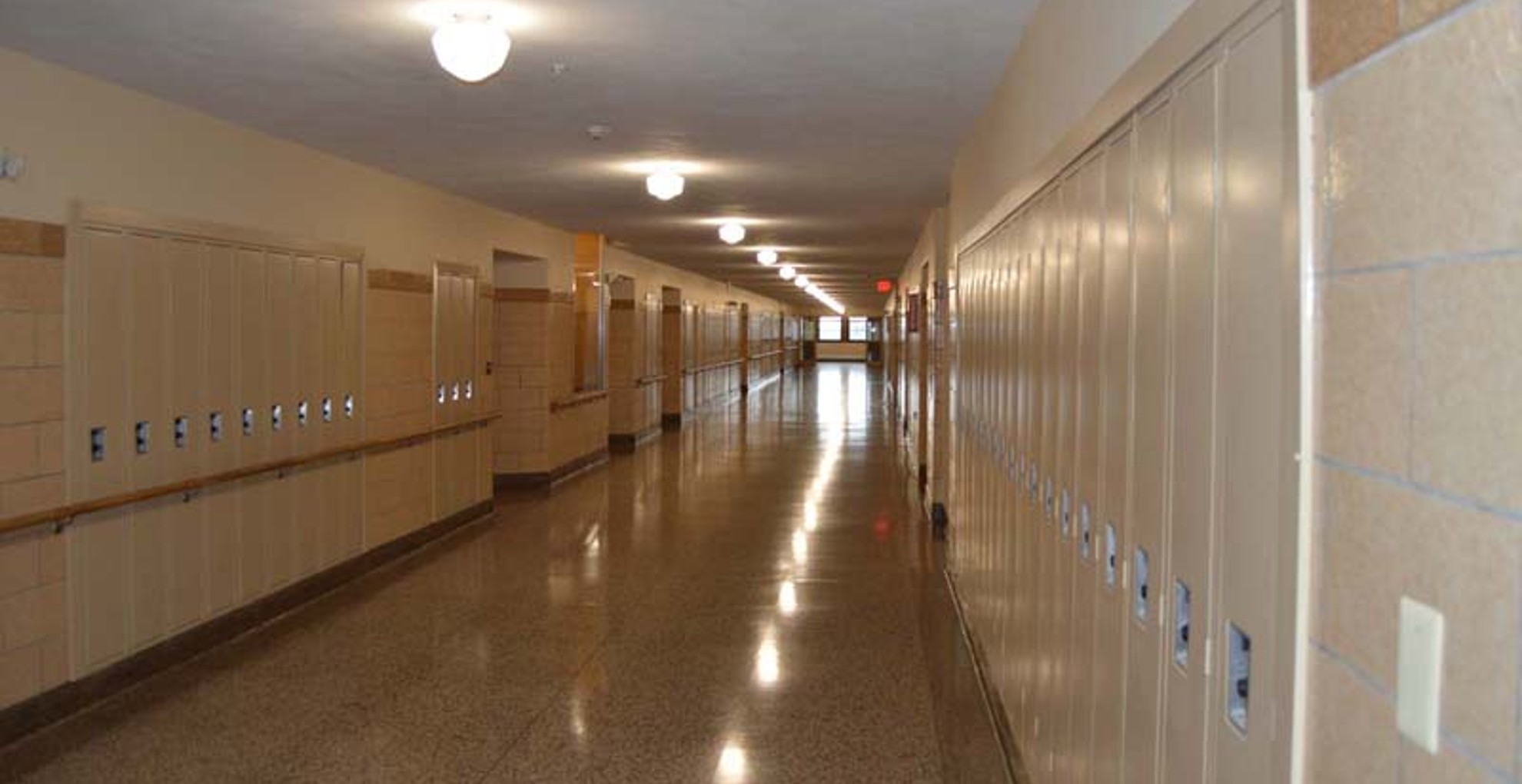 Rent Apartments near Auburn NY image of west middle school family apartments hallway from two plus four management