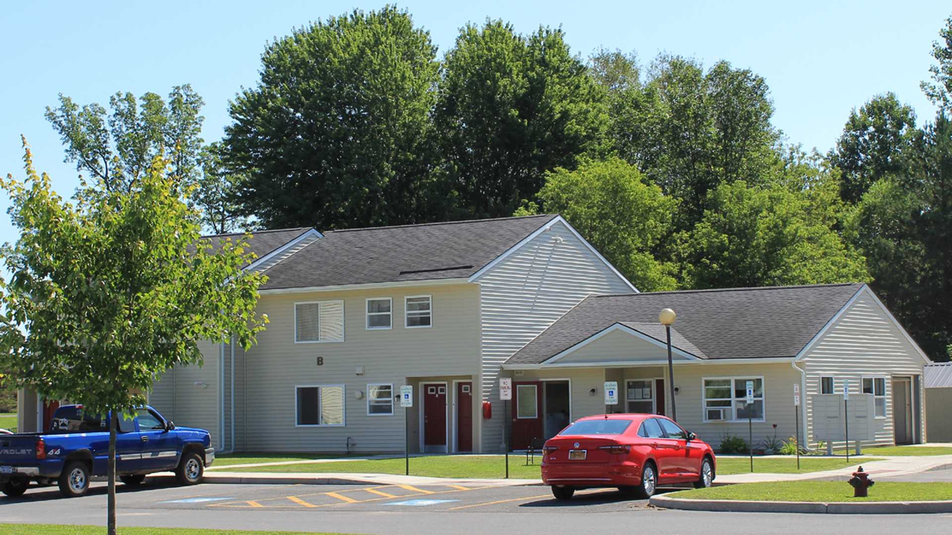 apartments near carthage ny image of Washington court apartments with parking from two plus four management