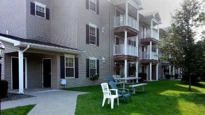 Senior Apartments near Homer NY thumbnail image of ellis pines apartments back entrance from two plus four property management